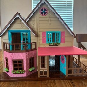 Charming Pink and Brown Dollhouse